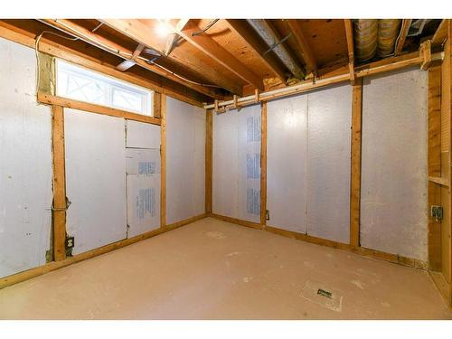 555 Woodpark Boulevard Sw, Calgary, AB - Indoor Photo Showing Basement