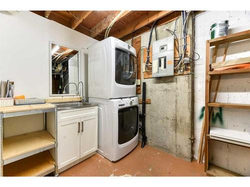 555 Woodpark Boulevard Sw, Calgary, AB - Indoor Photo Showing Laundry Room