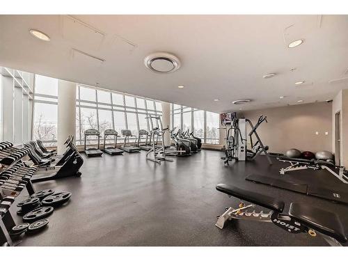 605-77 Spruce Place Sw, Calgary, AB - Indoor Photo Showing Gym Room