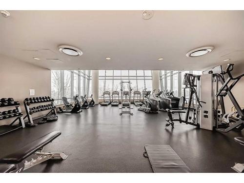 605-77 Spruce Place Sw, Calgary, AB - Indoor Photo Showing Gym Room