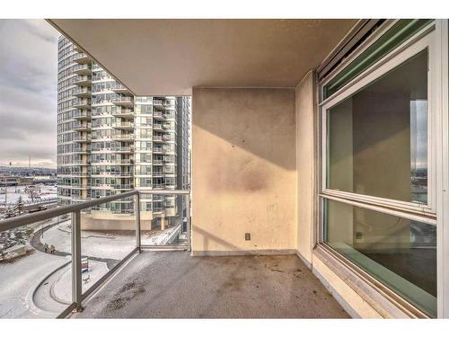 605-77 Spruce Place Sw, Calgary, AB - Outdoor With Balcony With Exterior