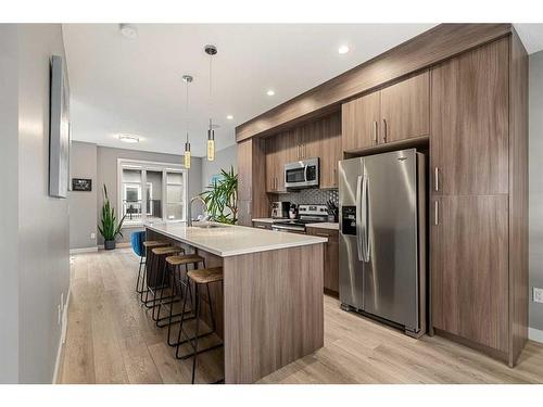 3-1930 26A Street Sw, Calgary, AB - Indoor Photo Showing Kitchen With Stainless Steel Kitchen With Upgraded Kitchen