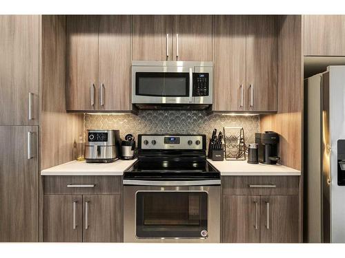 3-1930 26A Street Sw, Calgary, AB - Indoor Photo Showing Kitchen With Stainless Steel Kitchen