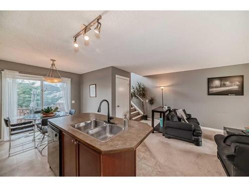 433 Tuscany Drive Nw, Calgary, AB - Indoor Photo Showing Kitchen With Double Sink