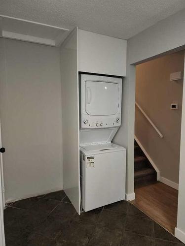 167 Whitman Place Ne, Calgary, AB - Indoor Photo Showing Laundry Room