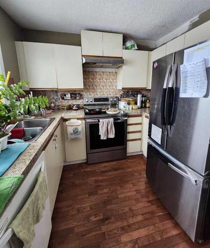 96 Martindale Boulevard Ne, Calgary, AB - Indoor Photo Showing Kitchen With Double Sink