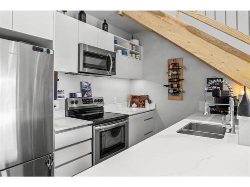 219B-1 Industrial Place, Canmore, AB - Indoor Photo Showing Kitchen With Stainless Steel Kitchen With Double Sink