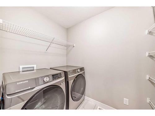 136 Lucas Heights Nw, Calgary, AB - Indoor Photo Showing Laundry Room