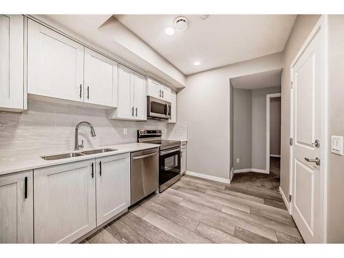 136 Lucas Heights Nw, Calgary, AB - Indoor Photo Showing Kitchen With Double Sink