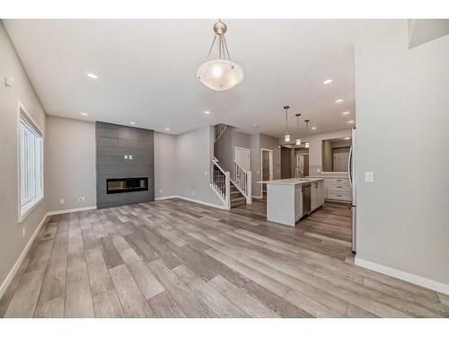 136 Lucas Heights Nw, Calgary, AB - Indoor With Fireplace