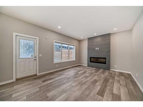 136 Lucas Heights Nw, Calgary, AB - Indoor With Fireplace