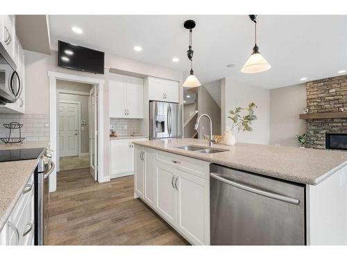 30 Marquis Heights Se, Calgary, AB - Indoor Photo Showing Kitchen With Double Sink With Upgraded Kitchen