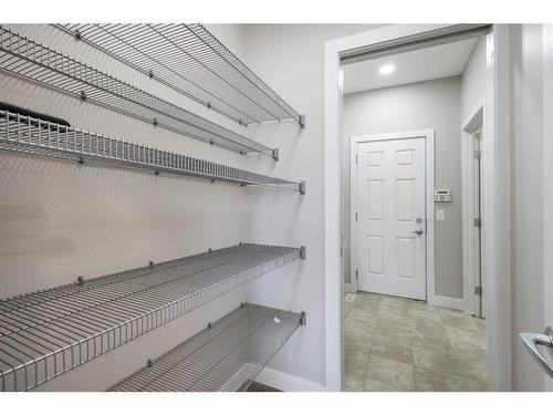 30 Marquis Heights Se, Calgary, AB - Indoor With Storage