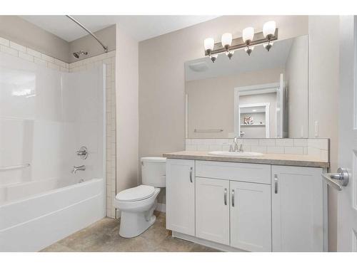 30 Marquis Heights Se, Calgary, AB - Indoor Photo Showing Bathroom