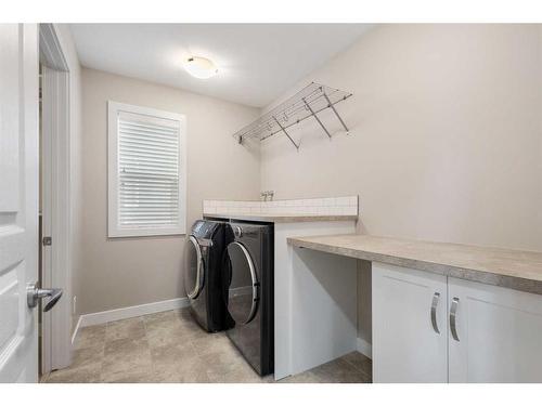 30 Marquis Heights Se, Calgary, AB - Indoor Photo Showing Laundry Room