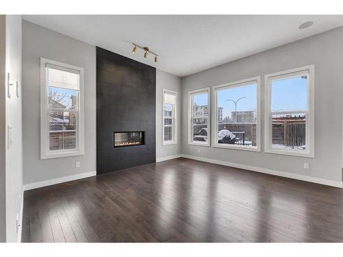 3 Sage Berry Rd Nw, Calgary, AB - Indoor Photo Showing Living Room With Fireplace