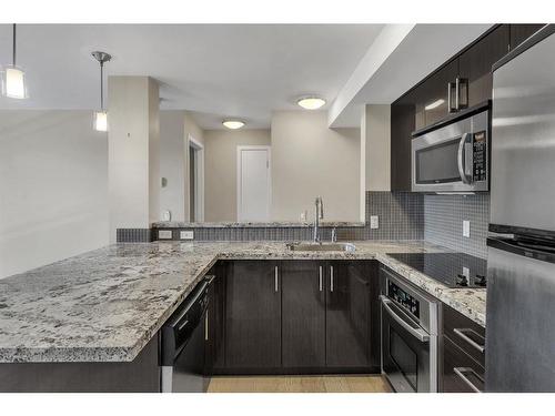 309-515 22 Avenue Sw, Calgary, AB - Indoor Photo Showing Kitchen With Upgraded Kitchen