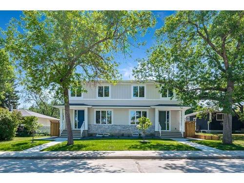 339 & 341 Hendon Drive Nw, Calgary, AB - Outdoor With Facade