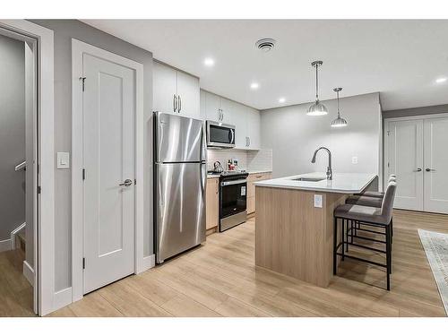 339 & 341 Hendon Drive Nw, Calgary, AB - Indoor Photo Showing Kitchen With Upgraded Kitchen