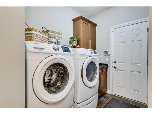 55 Bridlerange Circle Sw, Calgary, AB - Indoor Photo Showing Laundry Room