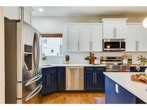 55 Bridlerange Circle Sw, Calgary, AB - Indoor Photo Showing Kitchen With Stainless Steel Kitchen With Upgraded Kitchen