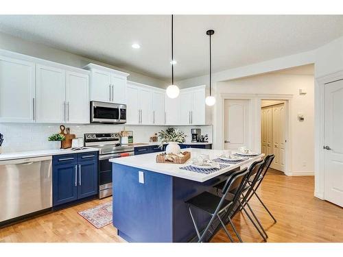 55 Bridlerange Circle Sw, Calgary, AB - Indoor Photo Showing Kitchen With Stainless Steel Kitchen With Upgraded Kitchen