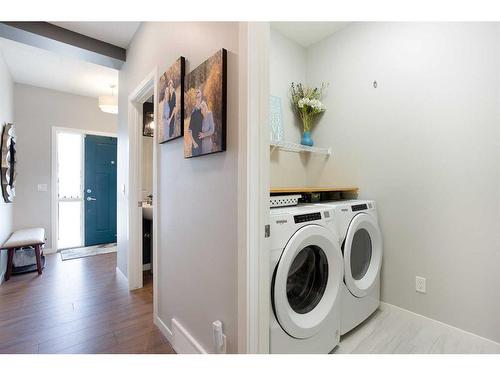 110-55 Fireside Circle, Cochrane, AB - Indoor Photo Showing Laundry Room