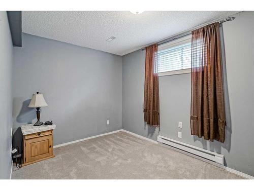 172 Tuscarora Heights Nw, Calgary, AB - Indoor Photo Showing Other Room