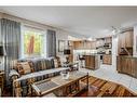 172 Tuscarora Heights Nw, Calgary, AB  - Indoor Photo Showing Living Room 