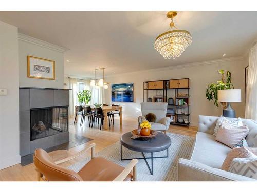 920 Elizabeth Road Sw, Calgary, AB - Indoor Photo Showing Living Room With Fireplace