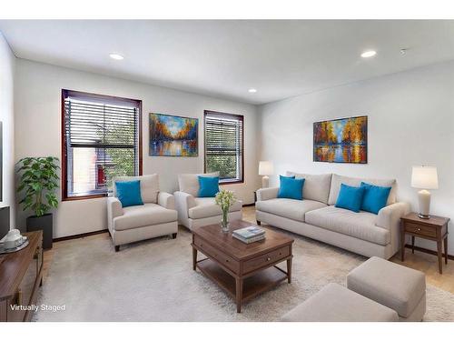 217 Elgin Manor Se, Calgary, AB - Indoor Photo Showing Living Room