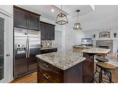 94 Tuscany Ridge Close Nw, Calgary, AB - Indoor Photo Showing Kitchen With Upgraded Kitchen