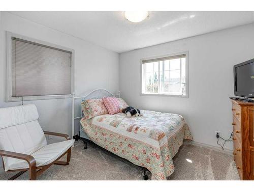 94 Tuscany Ridge Close Nw, Calgary, AB - Indoor Photo Showing Bedroom