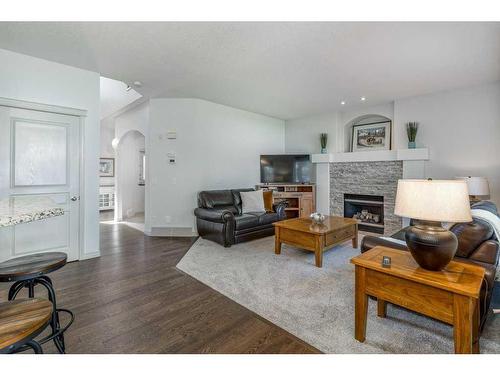 94 Tuscany Ridge Close Nw, Calgary, AB - Indoor Photo Showing Living Room With Fireplace