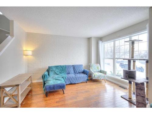 106 Cramond Place Se, Calgary, AB - Indoor Photo Showing Living Room