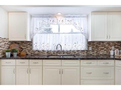 620 55 Street Se, Calgary, AB - Indoor Photo Showing Kitchen With Double Sink