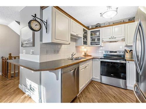 158 Mt Aberdeen Manor Se, Calgary, AB - Indoor Photo Showing Kitchen With Stainless Steel Kitchen With Double Sink