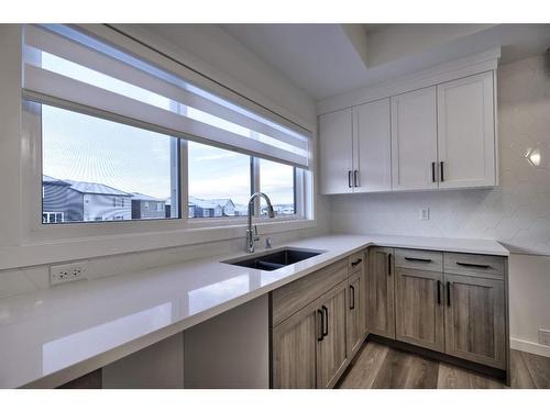 97 Legacy Reach Circle Se, Calgary, AB - Indoor Photo Showing Kitchen With Double Sink