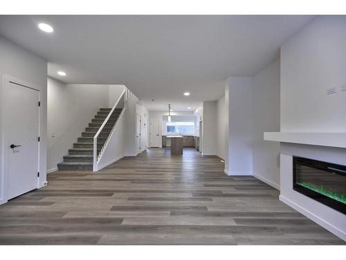 97 Legacy Reach Circle Se, Calgary, AB - Indoor With Fireplace