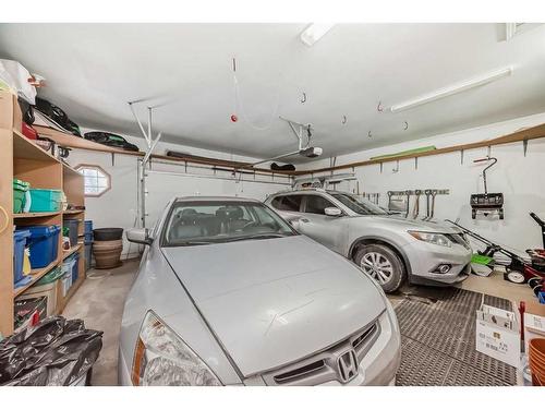 99 Hampshire Close Nw, Calgary, AB - Indoor Photo Showing Garage