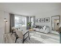 8460 61 Avenue Nw, Calgary, AB  - Indoor Photo Showing Living Room 