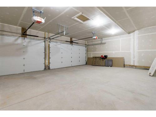 710 Mandalay Boulevard, Carstairs, AB - Indoor Photo Showing Garage