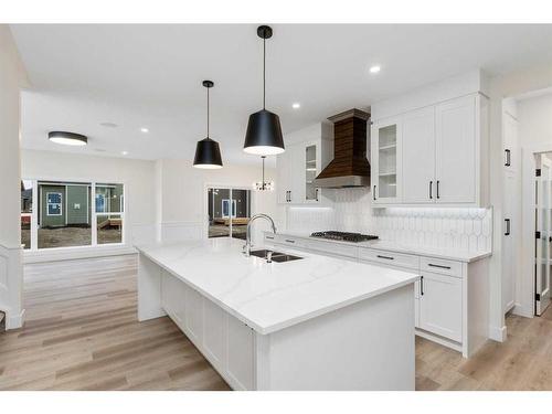 710 Mandalay Boulevard, Carstairs, AB - Indoor Photo Showing Kitchen With Double Sink With Upgraded Kitchen