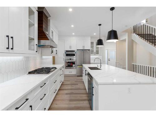 710 Mandalay Boulevard, Carstairs, AB - Indoor Photo Showing Kitchen With Double Sink With Upgraded Kitchen