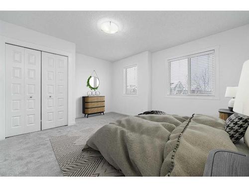 111 Auburn Bay Street Se, Calgary, AB - Indoor Photo Showing Bedroom