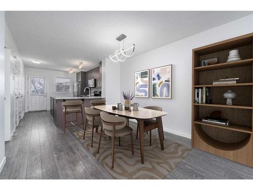 111 Auburn Bay Street Se, Calgary, AB - Indoor Photo Showing Kitchen With Double Sink With Upgraded Kitchen