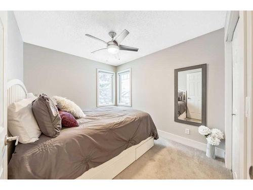 27 Deermoss Bay Se, Calgary, AB - Indoor Photo Showing Bedroom