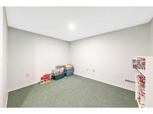 27 Deermoss Bay Se, Calgary, AB - Indoor Photo Showing Other Room