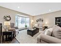 27 Deermoss Bay Se, Calgary, AB  - Indoor Photo Showing Living Room 