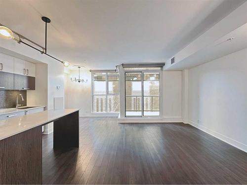 321-619 Confluence Way Se, Calgary, AB - Indoor Photo Showing Kitchen